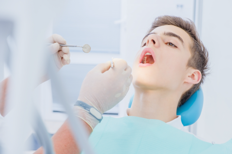 teen boy in orthodontists chair